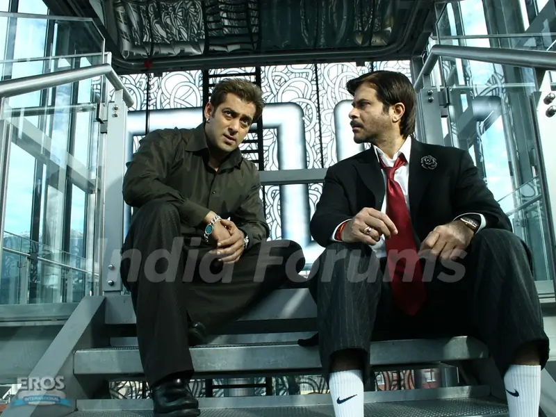 Anil Kapoor and Salman Khan sitting on the staircase