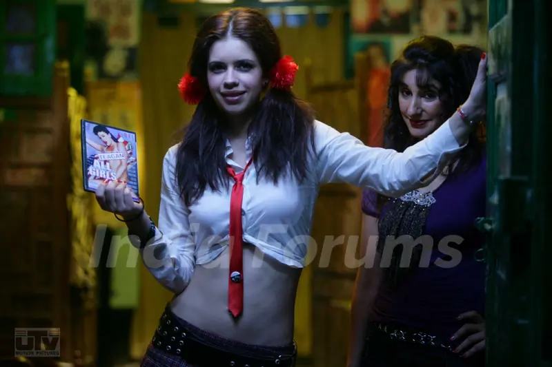 Kalki Koechlin with a CD box