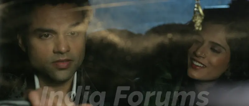 Abhay Deol sitting with a lady