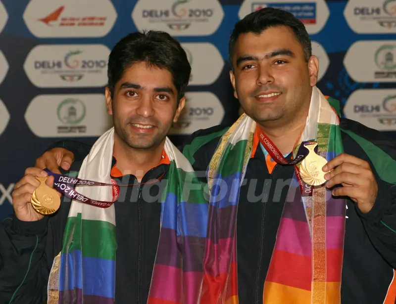 Abhinav Bindra and Gagan Narang after winning the Gold in Shooting Pairs 10 M Air Rifle Men, event at the 19 Commonwealth Games 2010 in New Delhi