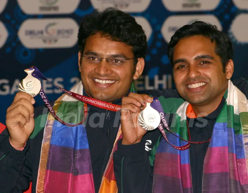Omkar Singh and Deepak Sharma after winning the Silver in Shooting Pairs 50 M Pistol Men, event at the 19 Commonwealth Games 2010 in New Delhi