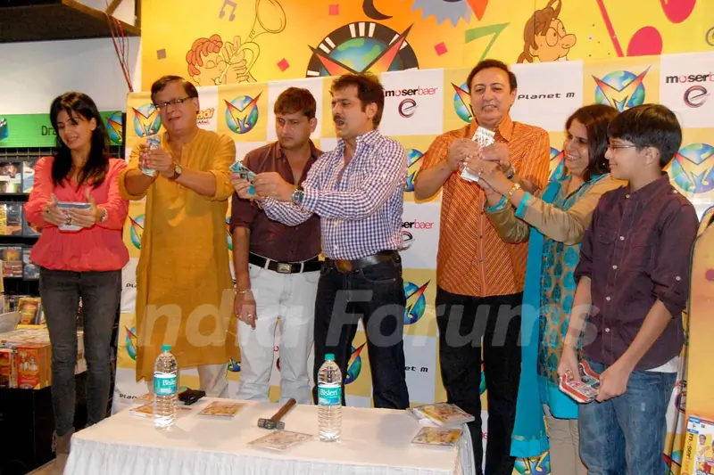 Khichdi (the Movie) cast & crew - destroy pirated CDs of the movie - as a symbolic gesture against anti-piracy, before the launch of its home Video by Moser Baer Entertainment