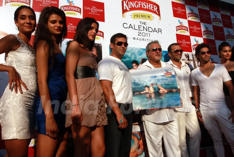 Dr.Vijay Mallaya along with Salman Khan, his son Siddharth and Models  at Kingfisher Calendar Launch 2011
