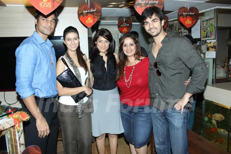 Karan V Grover, Simple Kaul and Khushboo Garewal at IOSIS event with underprivileged children
