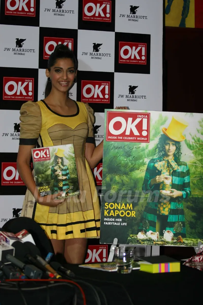 Sonam Kapoor shows off the OK magazine cover at its launch event held at Enigma in Mumbai