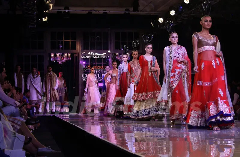 Models showcasing designer Manish Malhotra's creations at Synergy1 Delhi Couture Week,in New Delhi