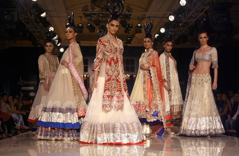 Models showcasing designer Manish Malhotra's creations at Synergy1 Delhi Couture Week,in New Delhi