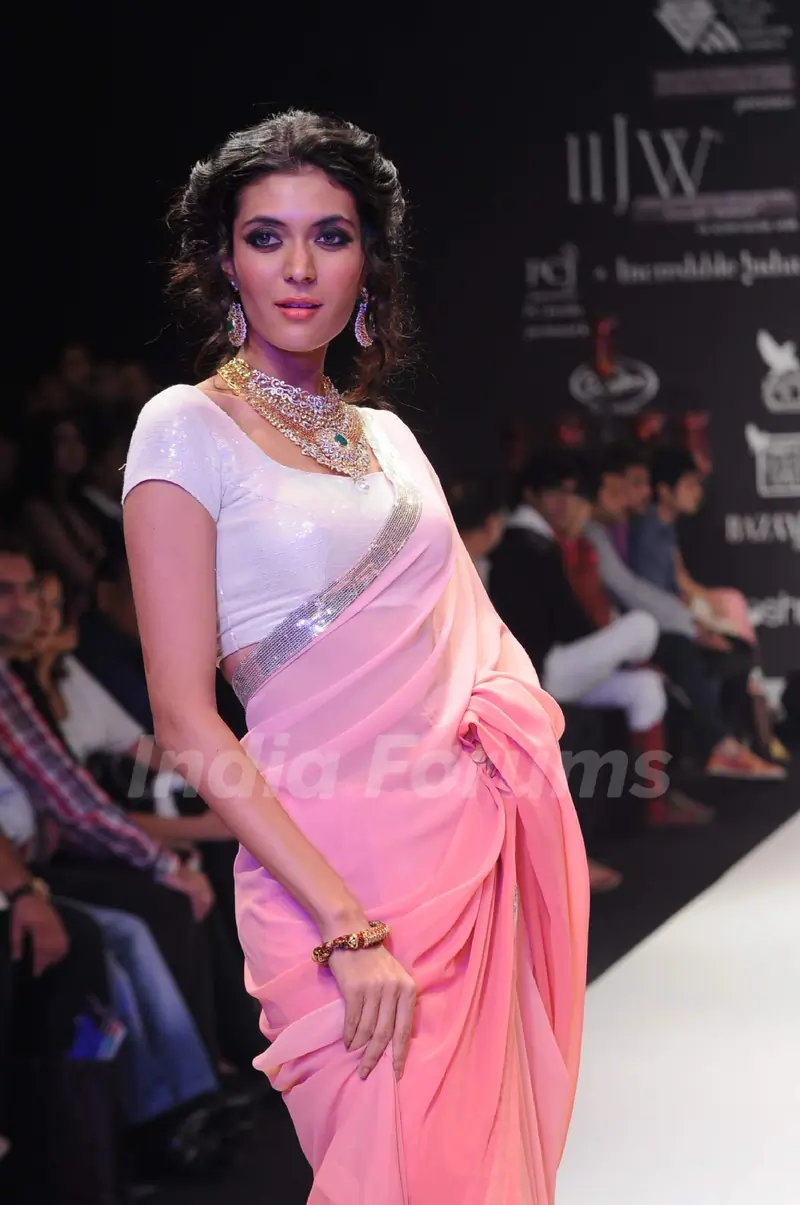 Models walk on the ramp for Manubhai Gems at IIJW 2011 show day 3. .