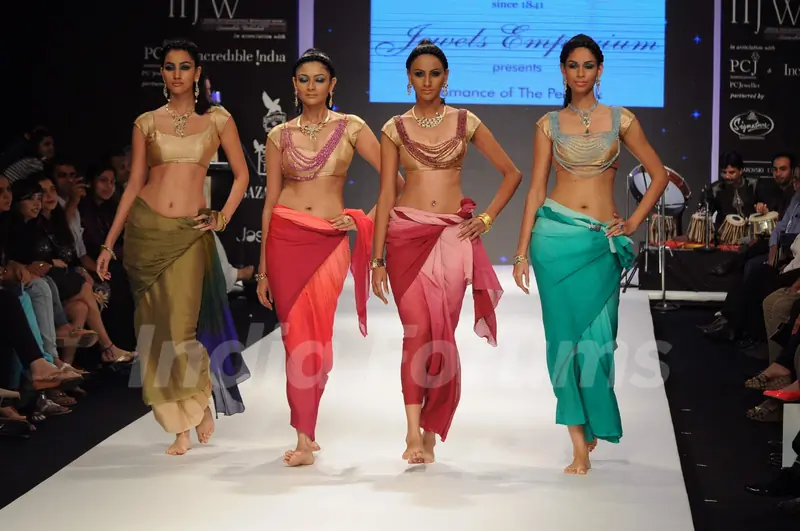 Models walk on the ramp for Jewels Emporium at IIJW 2011 show day 3. .