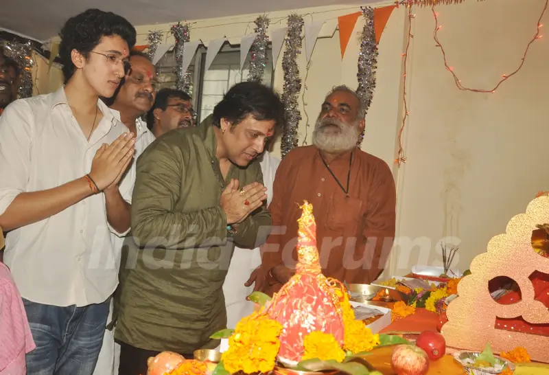 Govinda paying devote to Lord Ganesha during the occasion of Ganesh Chaturthi at their home