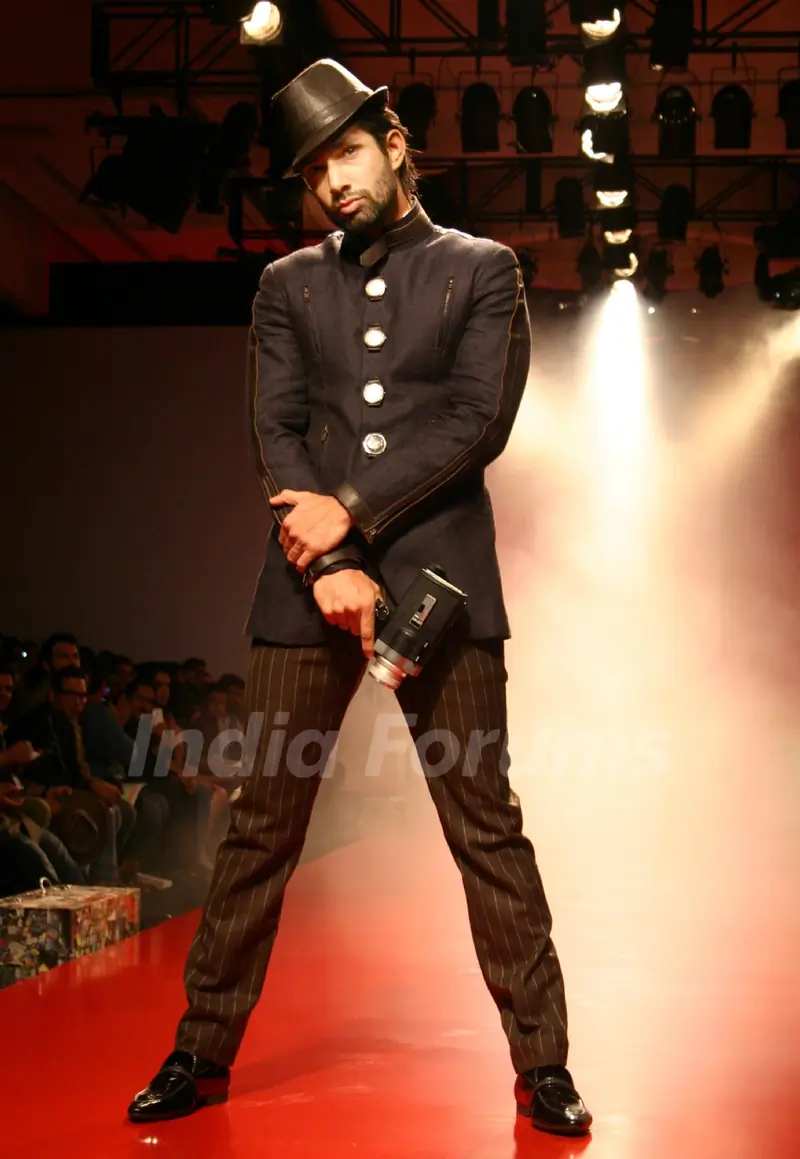 A model showcasing designer Arjun Khanna's creation at the Ven Heusen India Mens Week 2011, in New Delhi on Friday. .
