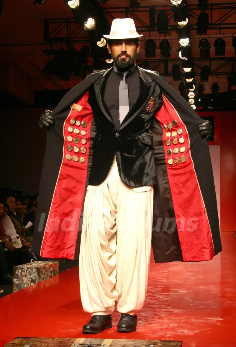 A model showcasing designer Arjun Khanna's creation at the Ven Heusen India Mens Week 2011, in New Delhi on Friday. .
