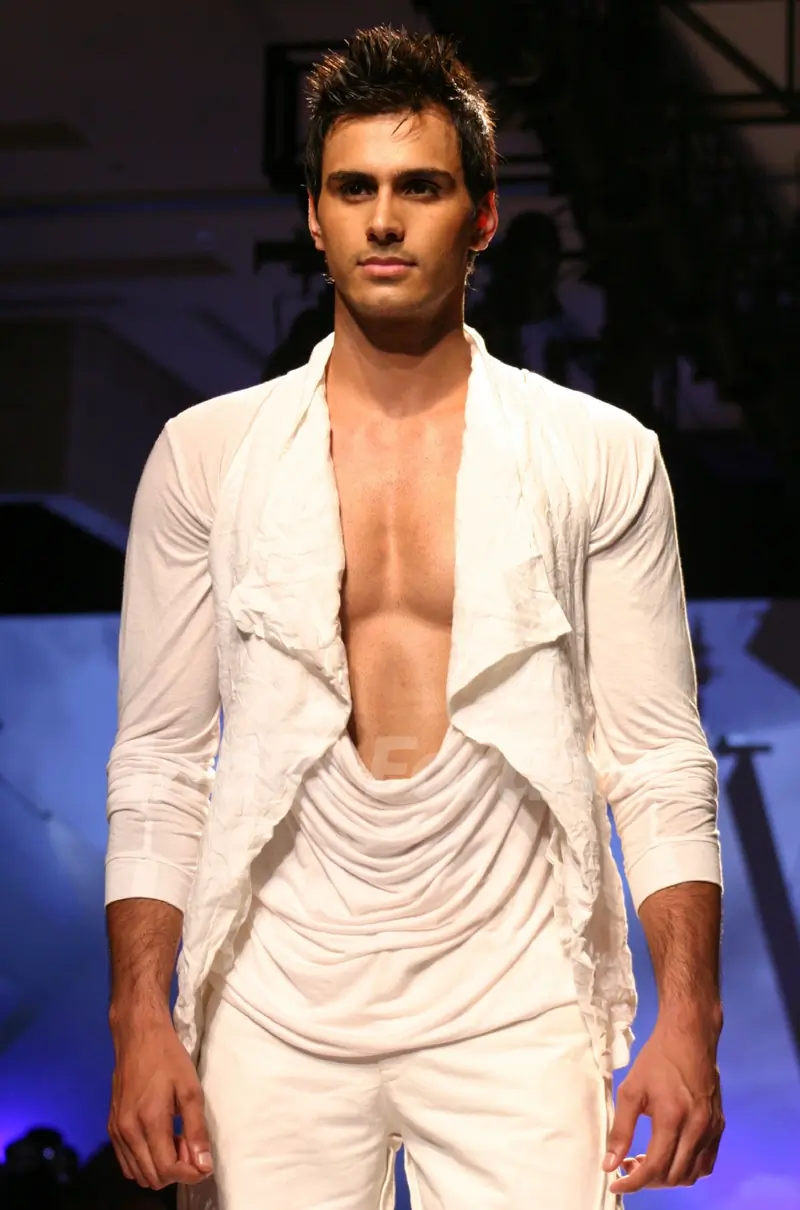 A model during designers Karan Johar and Varun Bahl's show  at the Van Heusen India Mens Week,in New Delhi on Sunday. .