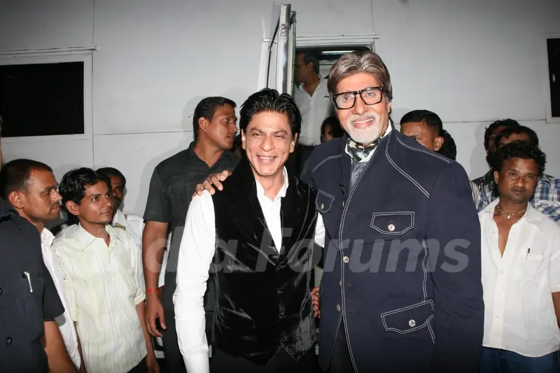 Amitabh Bachchan with Shah Rukh Khan on the sets of Kaun Banega Crorepati 5 in Mumbai