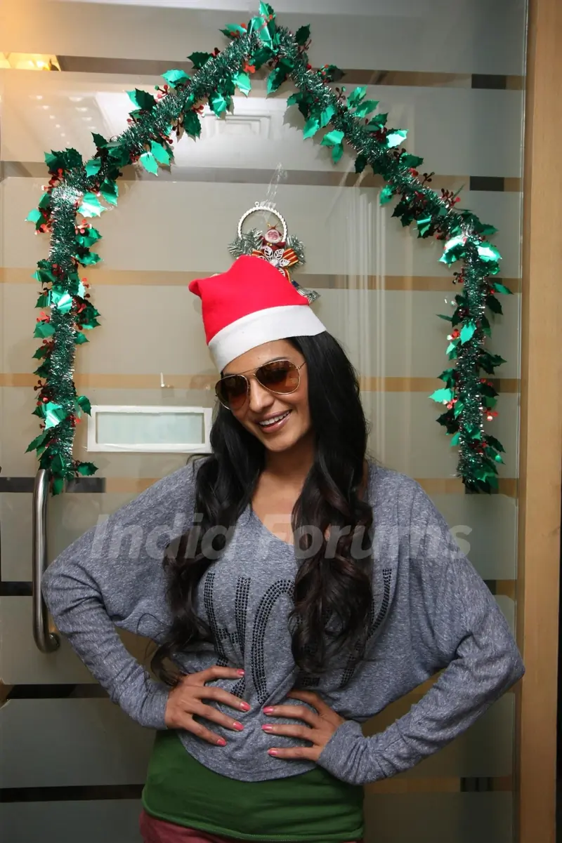 Veena Malik celebrating Christmas and posing with Christmas theme