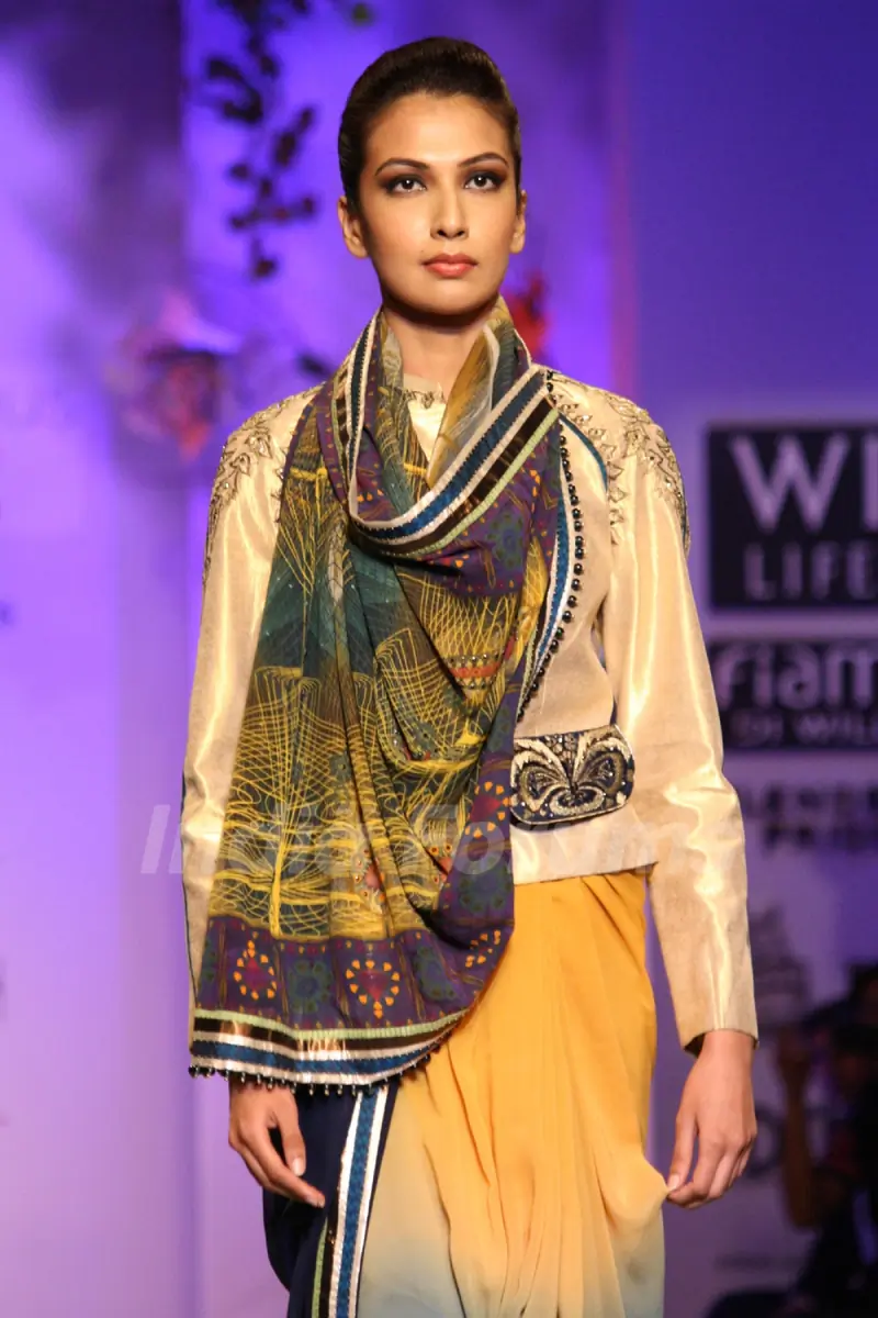 A model displays a creation by designer JJ Valaya during a special show at the Wills Lifestyle India Fashion week 2012,in New Delhi on Friday. .