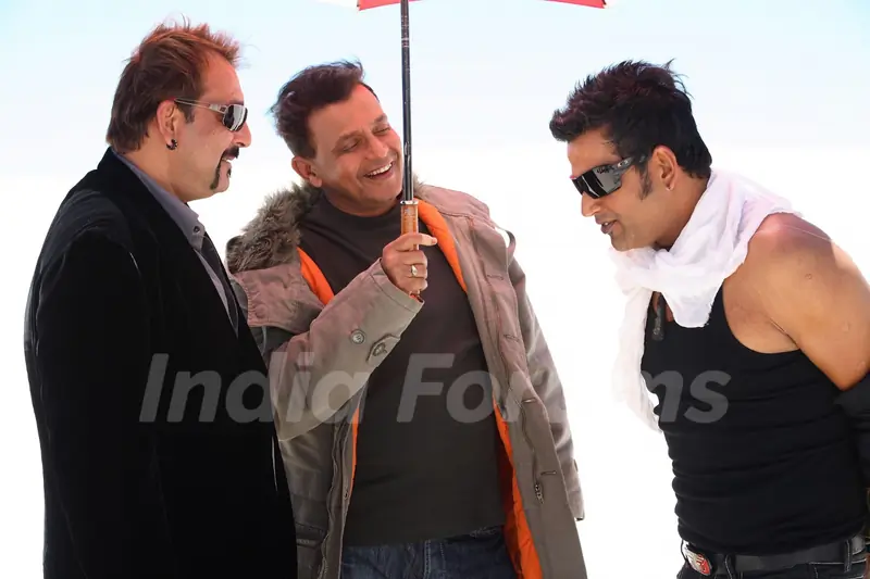 Mithun and Sanjay talking to Ravi