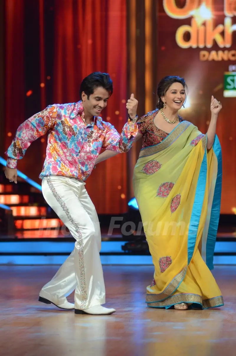 Bollywood actor Tusshar Kapoor shaking a leg with Madhuri Dixit on the sets of Jhalak Dikhhla Jaa in Filmistan. .