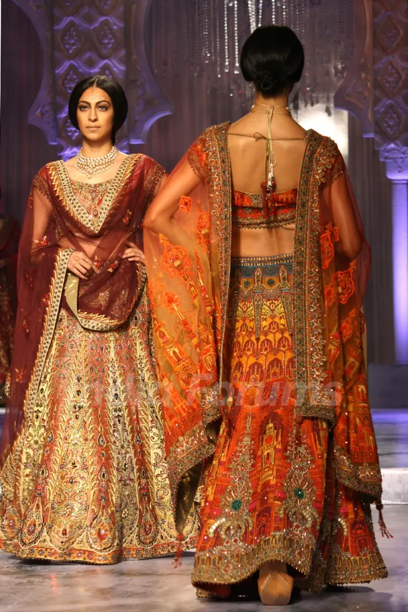 Models showcases a creation by designer JJ Valaya show at the Delhi Couture Week 2012, in New Delhi on Wednesday. .