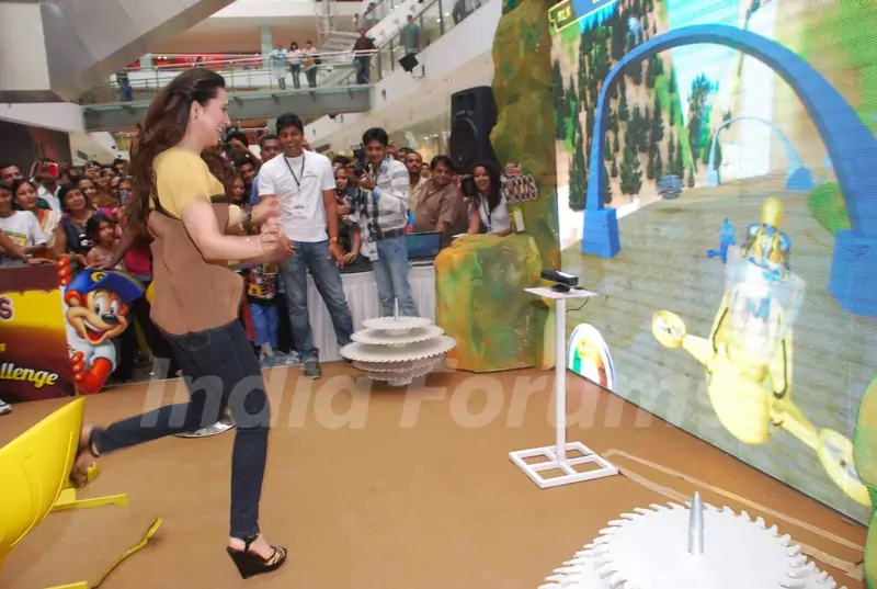 Brand ambassador of Kellogg's Chocos, Karisma Kapoor at the launch of 'Augmented Reality Game' in Oberoi Mall, Mumbai. .