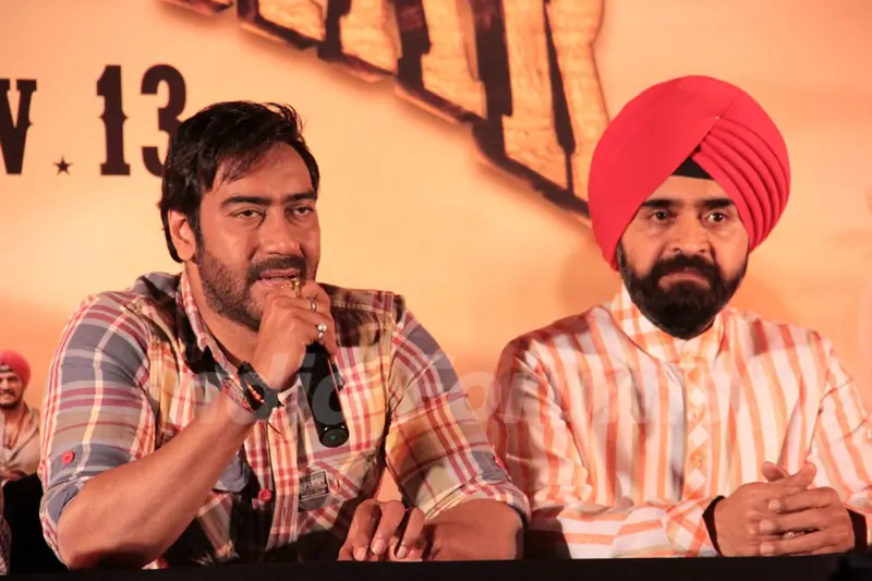 Bollywood actor Ajay Devgan and Congress leader Charan Singh Sapra at Son Of Sardaar press meet to resolve issues with Sikh Community leaders at Hotel Novotel in Juhu, Mumbai.