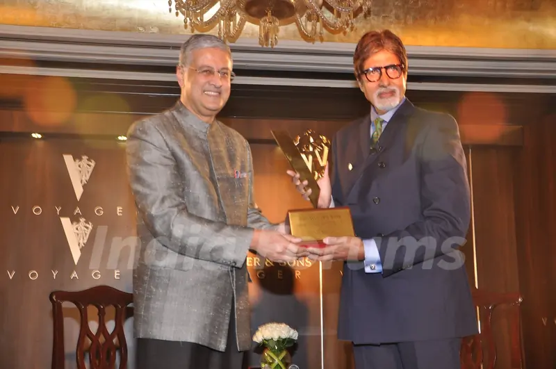 Chief Operating Officer Diageo plc Ivan Menezes honours bollywood actor Amitabh Bachchan as the 'John Walker & Sons Game Changer of the Century' at Hotel Taj Mahal Palace in Colaba, Mumbai.