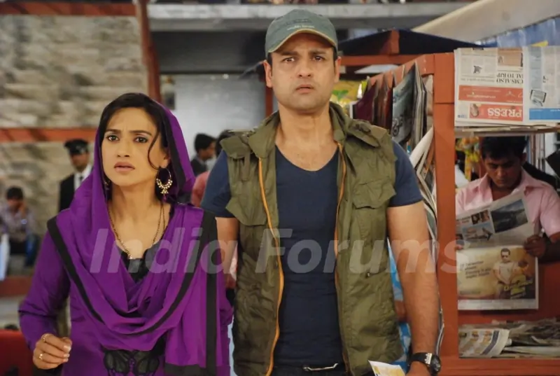 A still of Rati Pandey and Rohit Roy in Hitler Didi