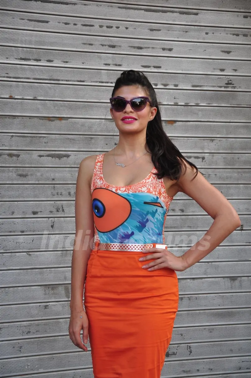 Jacqueline Fernandez poses for the photographers during the unveiling of new HTC One smart phone in Mumbai