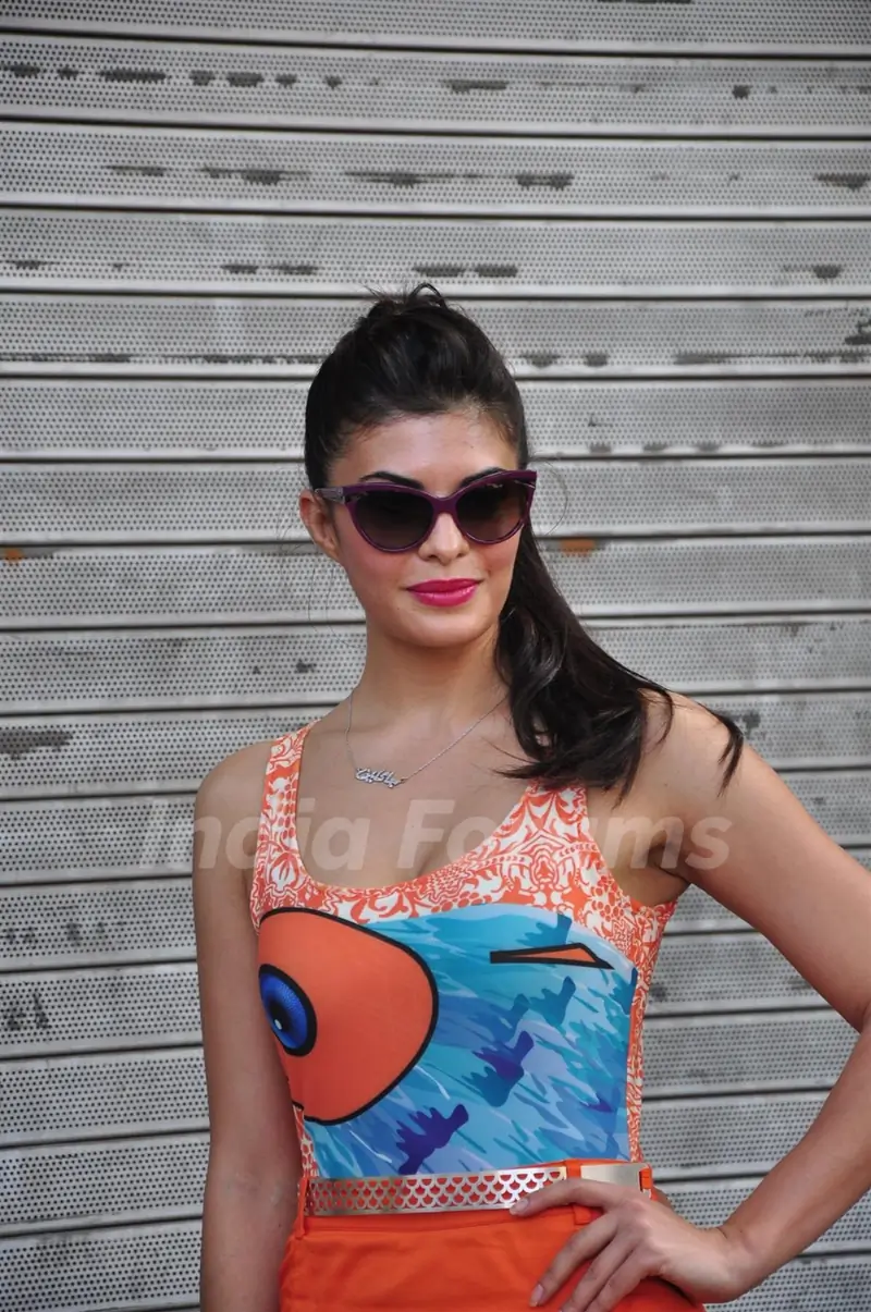 Jacqueline Fernandez poses for the photographers during the unveiling of new HTC One smart phone in Mumbai