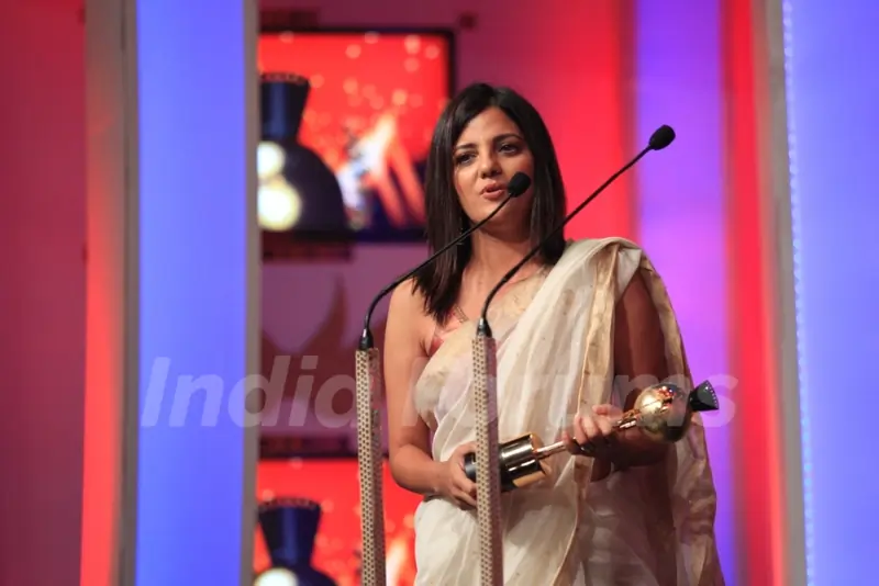 Rucha Pathak receiving an award at the SAIFTA award ceremony