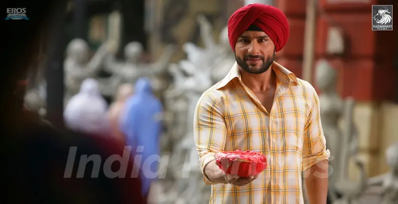 Saif Ali Khan giving sweets to his girlfriend
