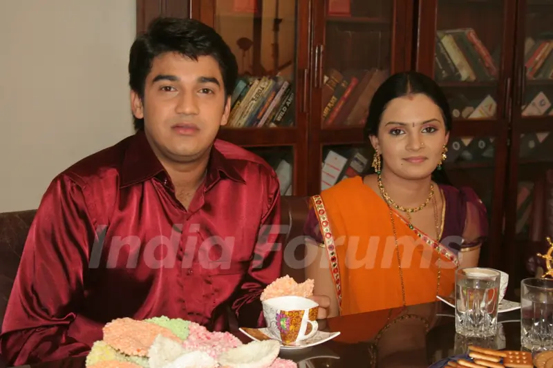 A still image of Mohan and Bhakti