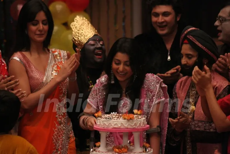Baby cutting the cake