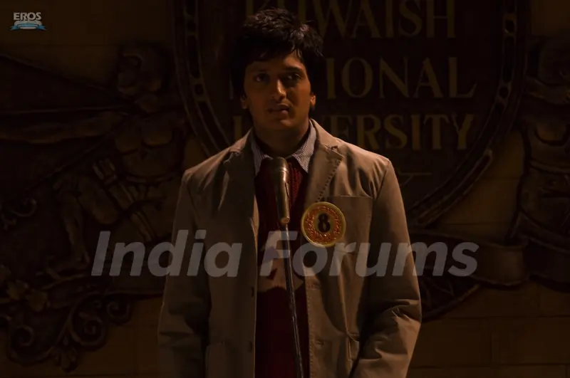 Ritesh Deshmukh standing on a stage