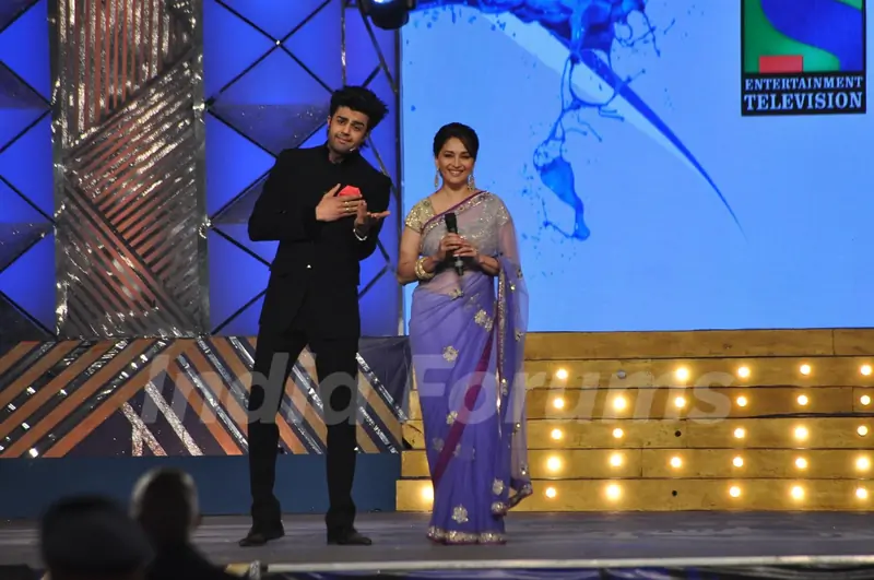 Manish Paul and Madhuri Dixit at the Umang 2014