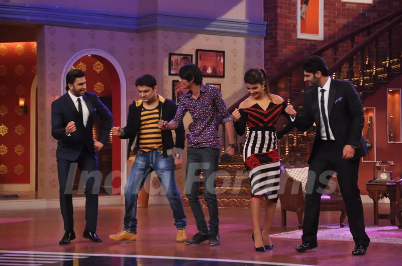 The cast of Gunday and Kapil Sharma perform with an audience member