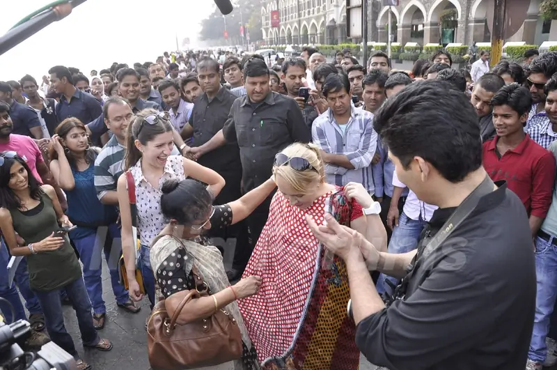 Karan Johar clicks pictures of the masses for TV show Mission Sapne