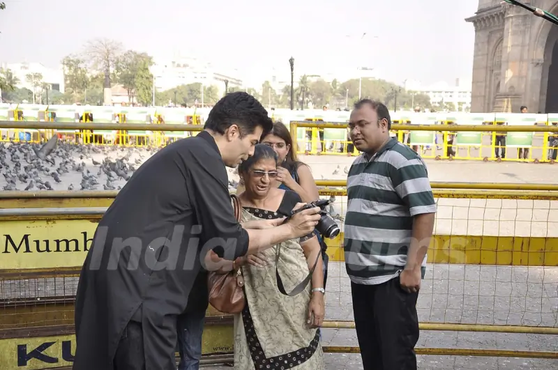 Karan Johar clicks pictures of the masses for TV show Mission Sapne