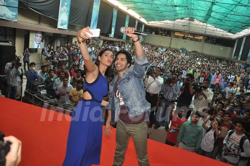 Nargis and Varun get a selfie of themselves with the crowd