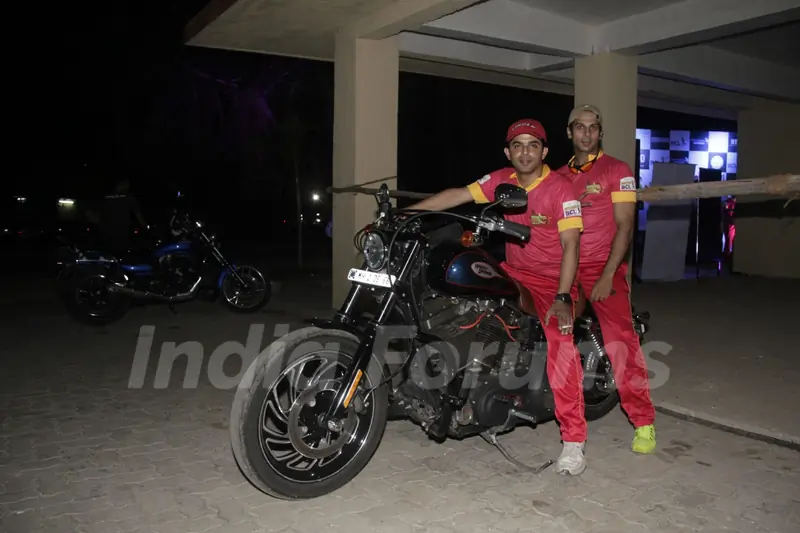 Raj and Karan show off their bike at the Box Cricket league inaugral match