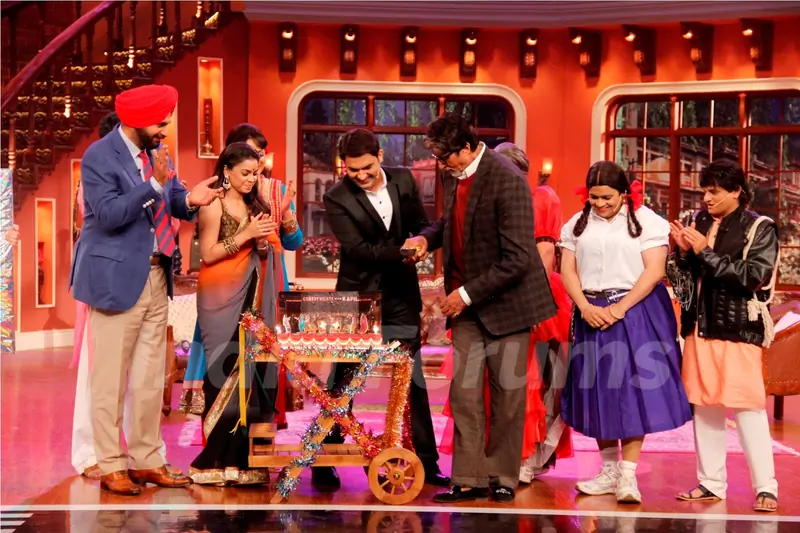 Kapil cuts his birthday cake with Big B