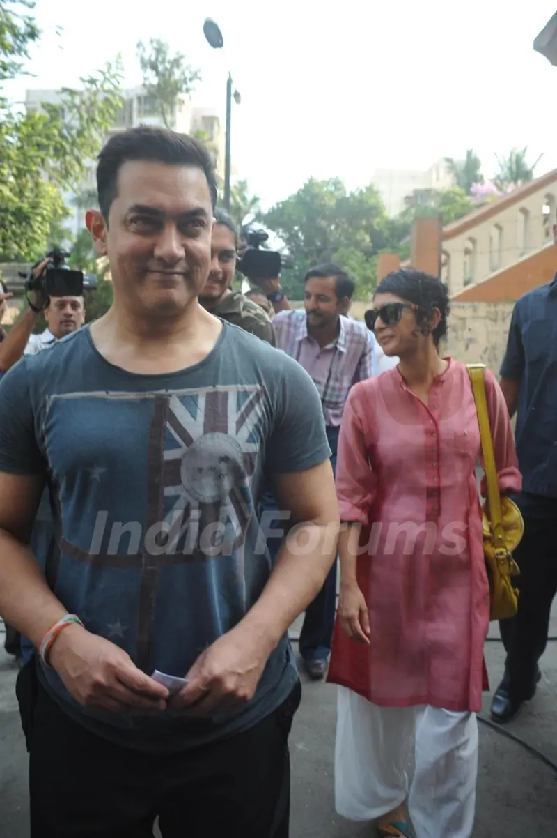 Aamir Khan and Kiran Rao arrives to vote at polling station in Mumbai