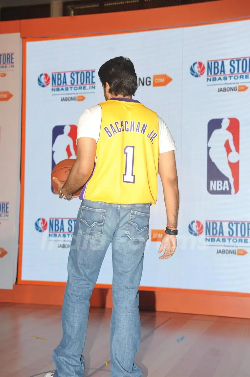 Abhishek Bachchan shows off his jersey at the Launch of NBA's first official online store in India