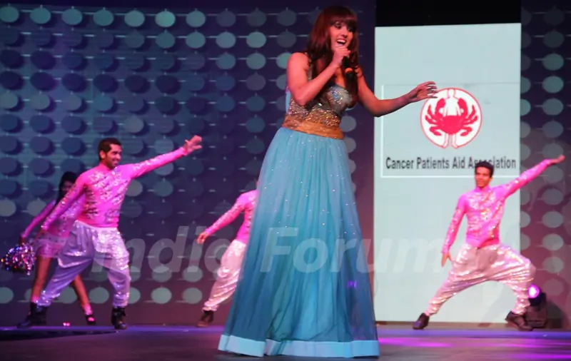 Neeti Mohan performs at the 'Caring with Style' fashion show at NSCI