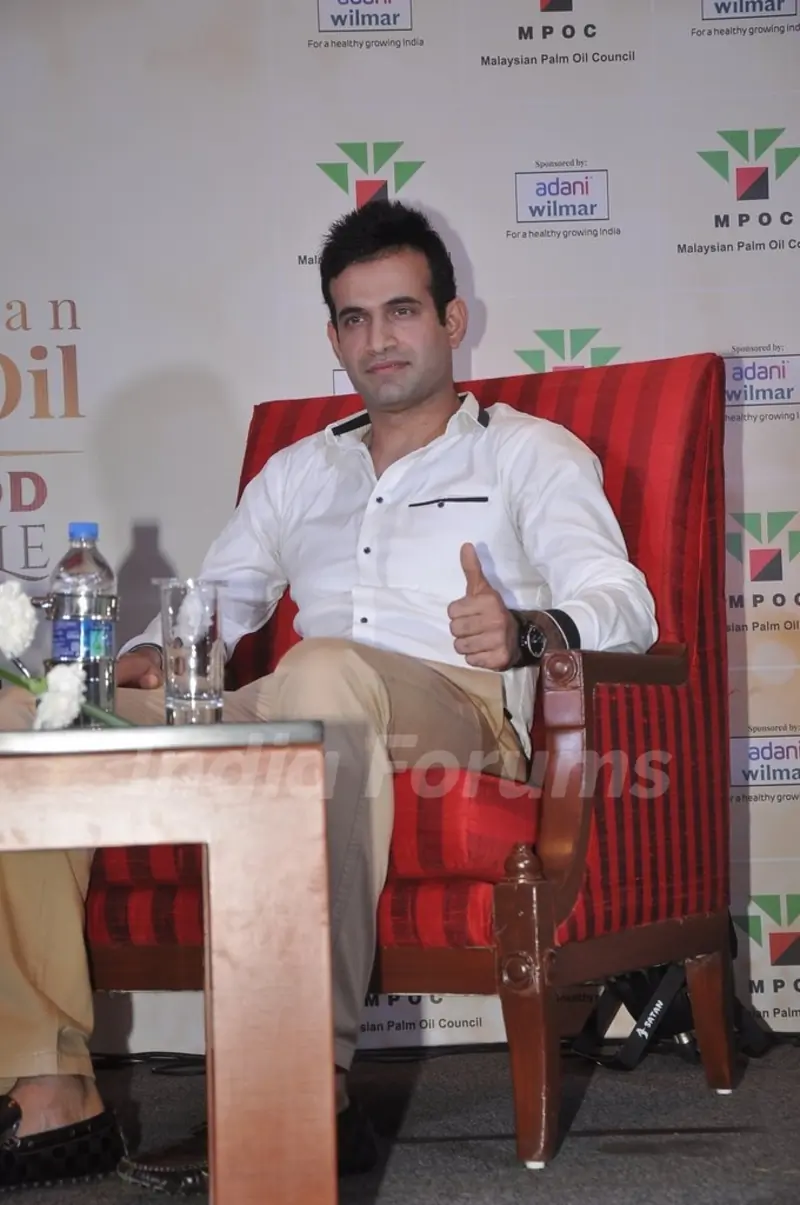 Irfan Pathan poses for the media