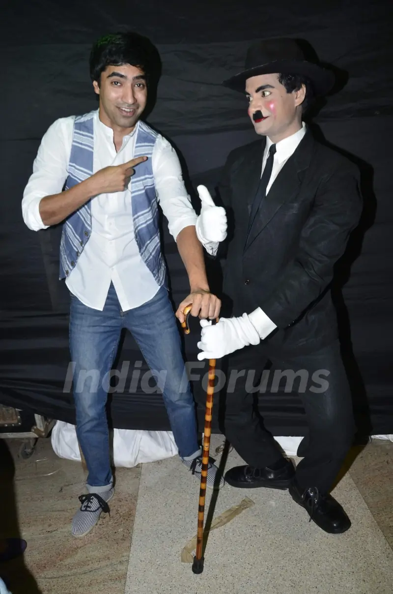 Arfi Lamba poses with Charlie Chaplin