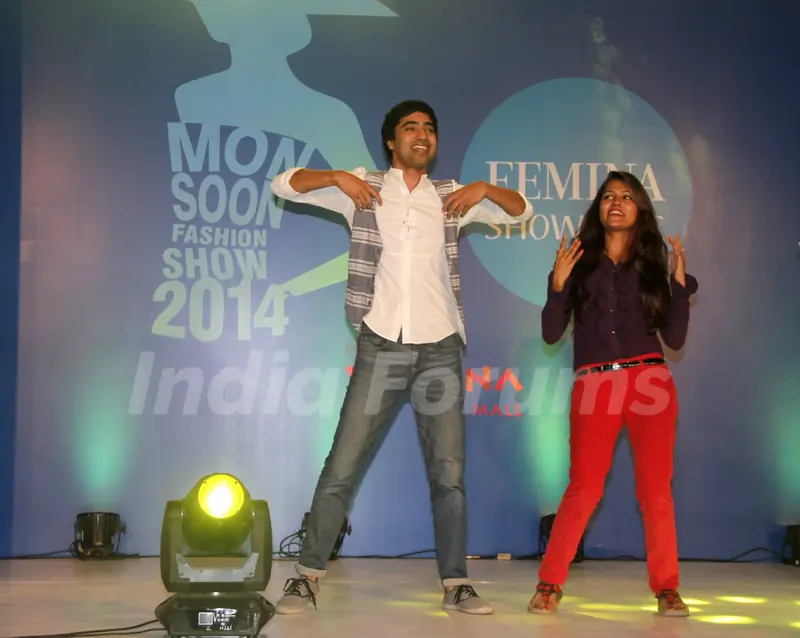 Arfi Lamba dances with a fan at the Showcase