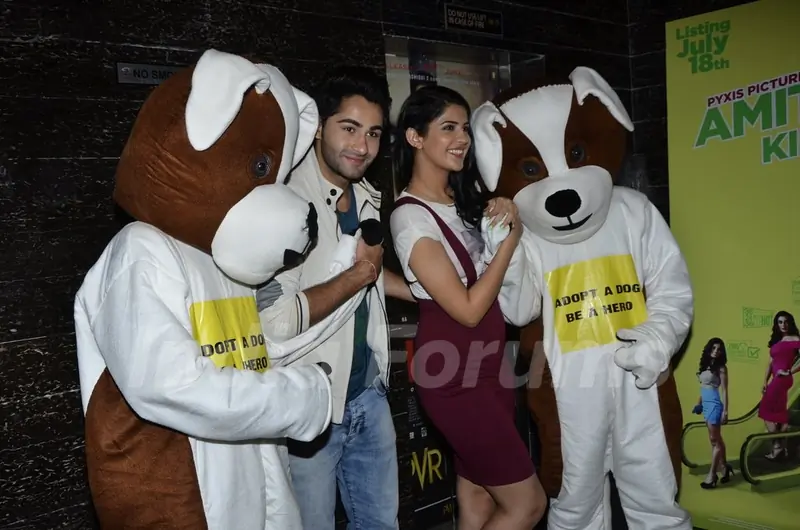Armaan and Deeksha pose with the Mascots of the Adopt a Dog Campaign