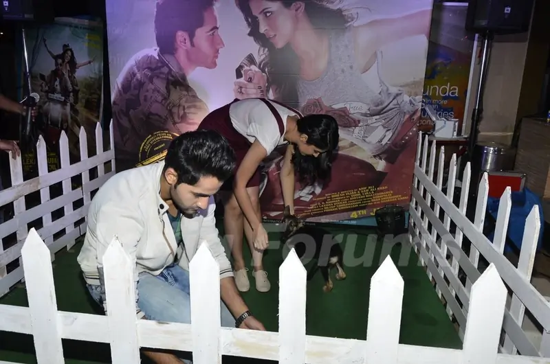 Armaan and Deeksha playing with puppies