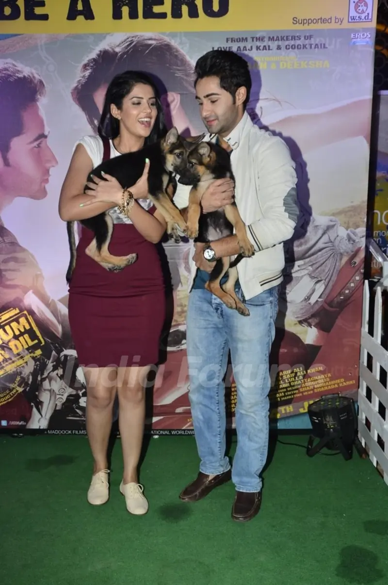 Armaan and Deeksha pose with puppies